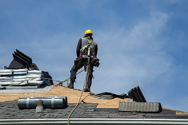 Professional Roof Replacement technician working in Ashburnham, MA